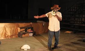 Silvanos Mudzvova performing on stage with megaphone